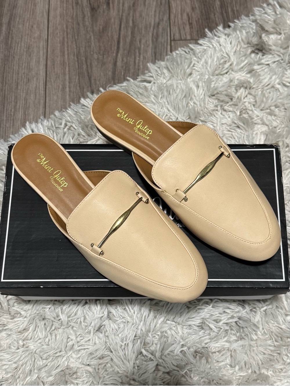 The Mint Julep Boutique Cream Slip-On Mule Loafers with Gold Accent
